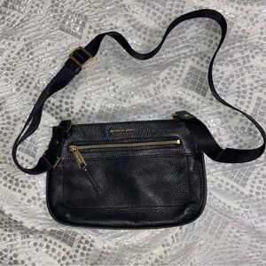 Michael Kors Pebbled Leather Bag.  Some small scratches on hardware that are har